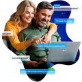A woman and man entrepreneurs looking at their computer getting website maintenance tasks completed